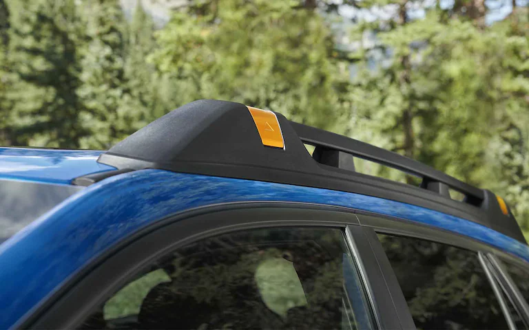 Close up of the roof rails on a blue 2022 Subaru Outback Wilderness