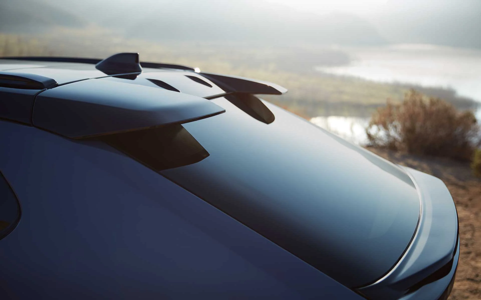 Close up of the wings on the roof of a blue 2023 Subaru Solterra EV