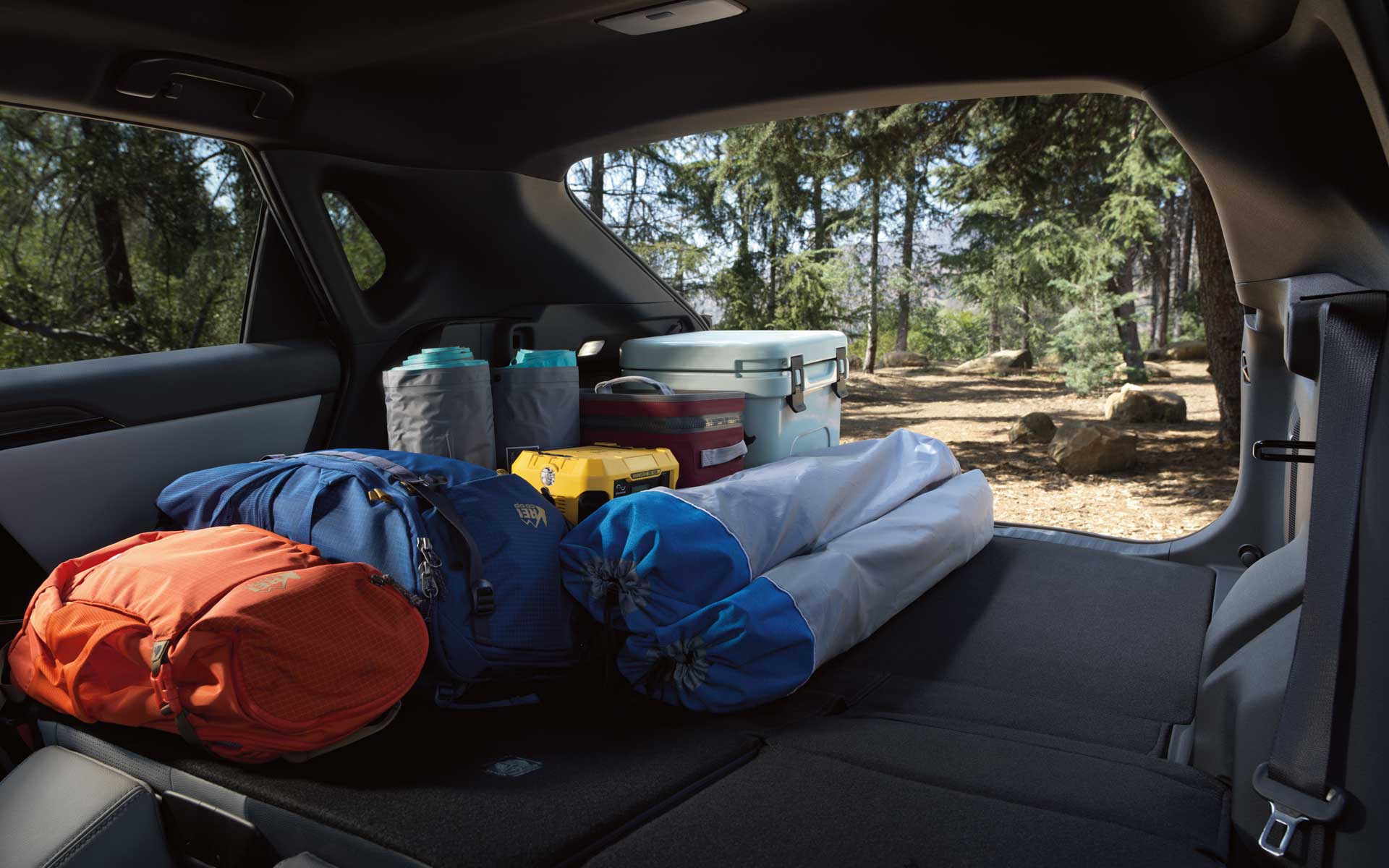 Camping gear inside the cargo space of a Subaru Solterra EV