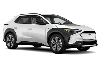 Side angled view of a white and black 2023 Subaru Solterra EV