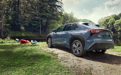 A 2023 Solterra parked near a river bank.