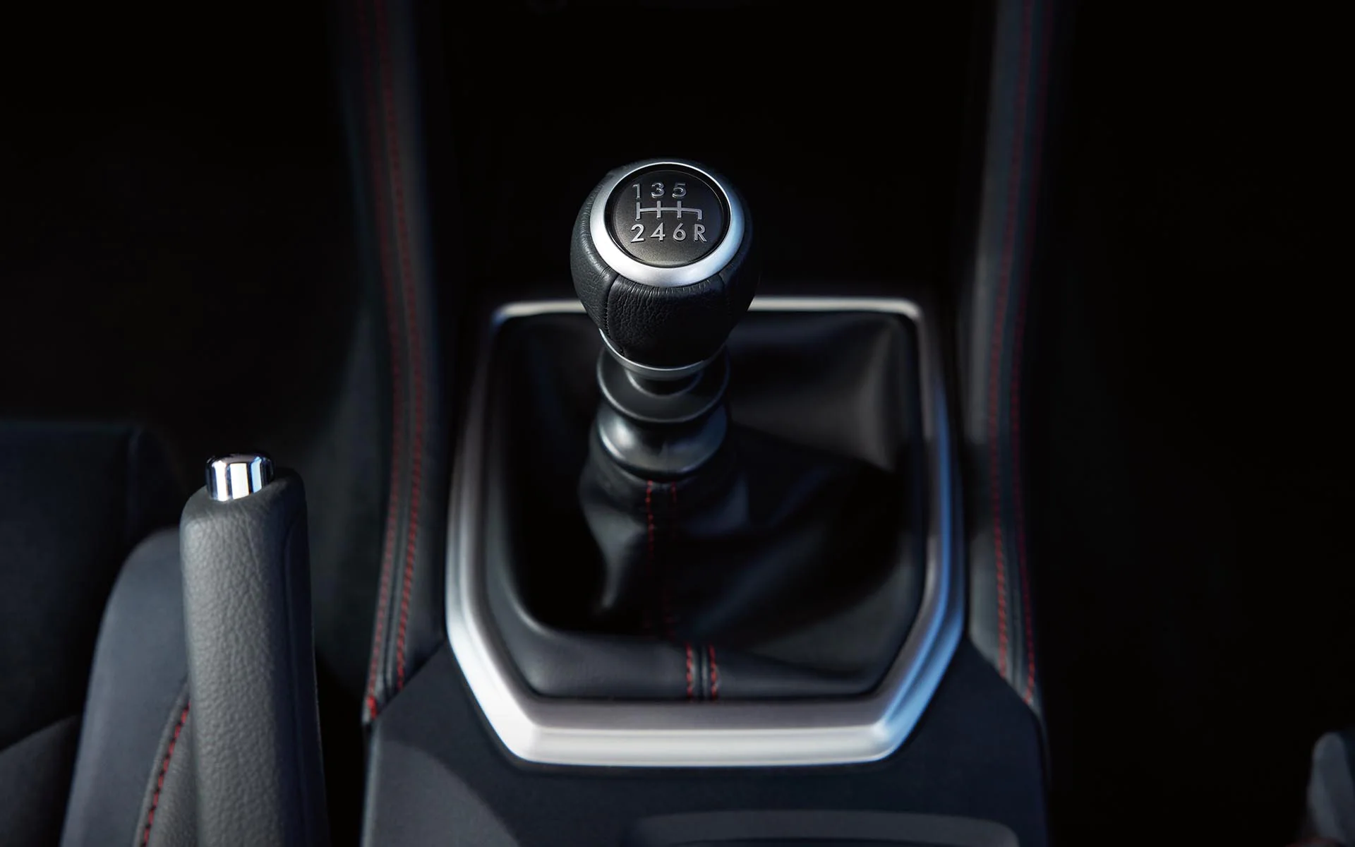Close up of the gear shift inside a Subaru WRX