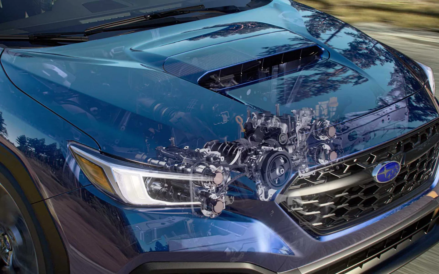 Engine under the transparent hood of a blue Subaru WRX