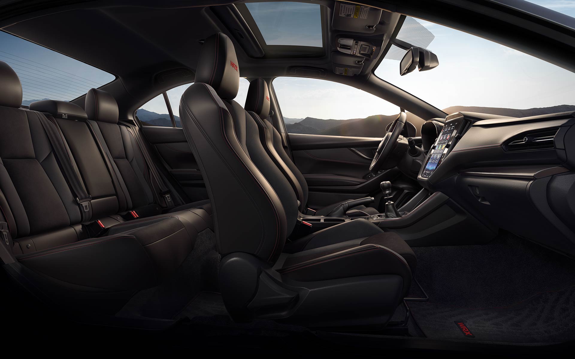 Side view of black leather seats inside a Subaru WRX
